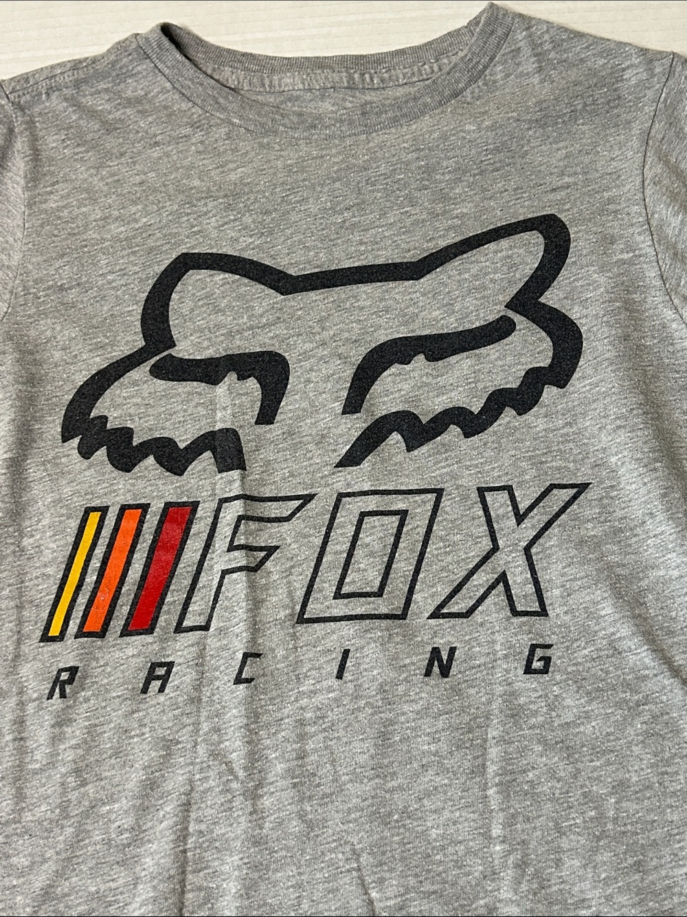 Fox Grey Tee with Black Logo and Orange-Yellow Accent